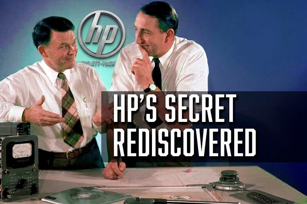 Image of Bill Hewlett and David Packard sharing a secret 