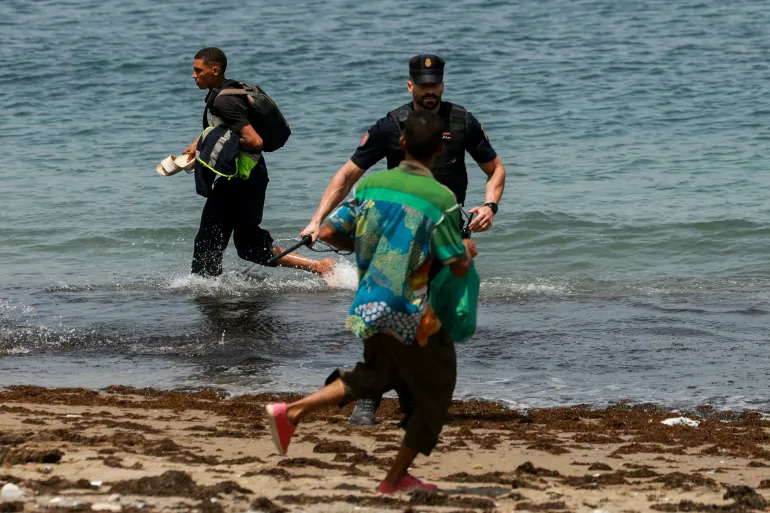 Cueta Quells Chaos From Migrants Fleeing From Morocco