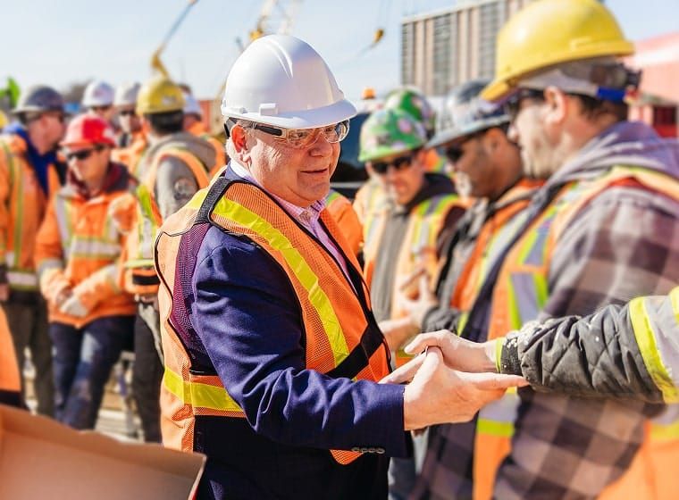 Trump threatens 50% tariff on Canadian autos