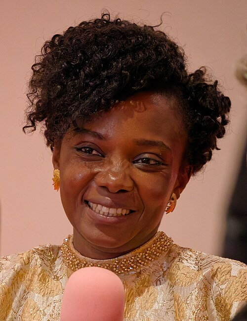 Camera d’Or winner Marie Clémentine Dusabejambo at the 2026 Cannes Film Festival winners press conference. By Kevin Payravi&nbsp;/&nbsp;WikiPortraits, CC BY-SA 4.0, https://commons.wikimedia.org/w/index.php?curid=192716530 