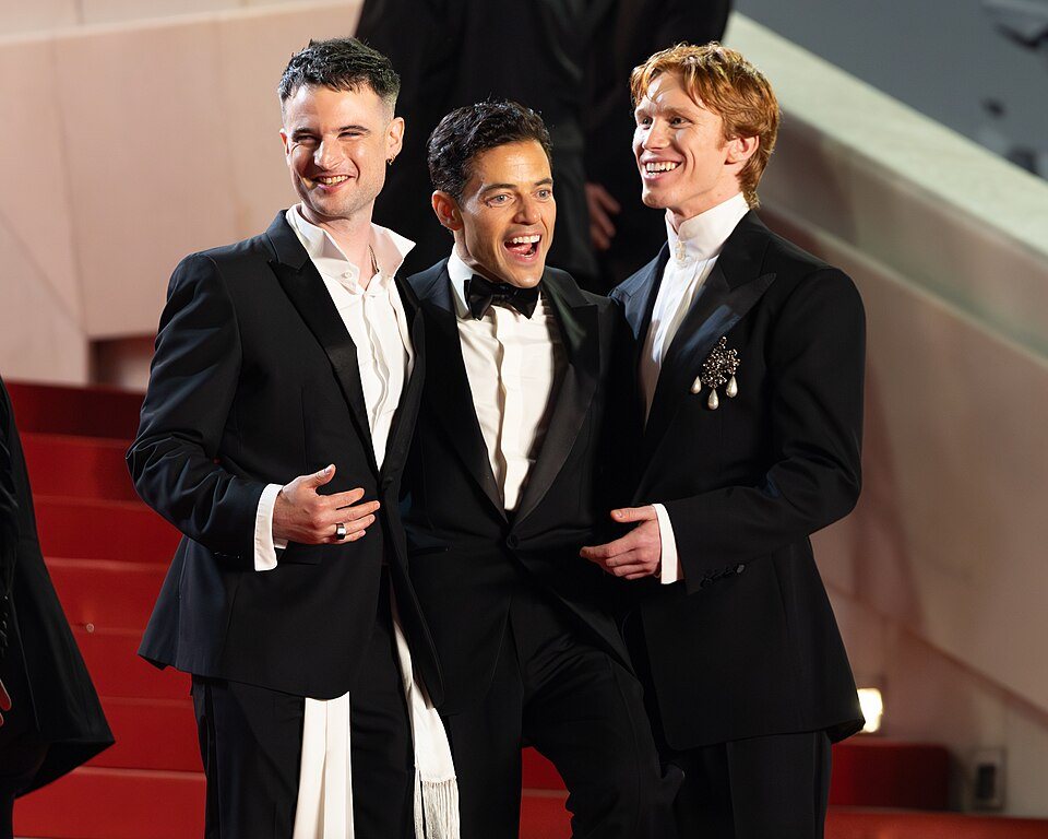 Tom Sturridge, Rami Malek and Luther Ford at Cannes Film Festival 2026 at the premiere of "The Man I Love." By Ondine Goat&nbsp;/&nbsp;WikiPortraits, CC BY-SA 4.0, https://commons.wikimedia.org/w/index.php?curid=192518813