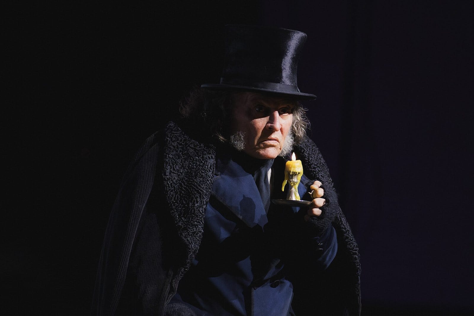 Johnny Depp as Ebenezer Scrooge.