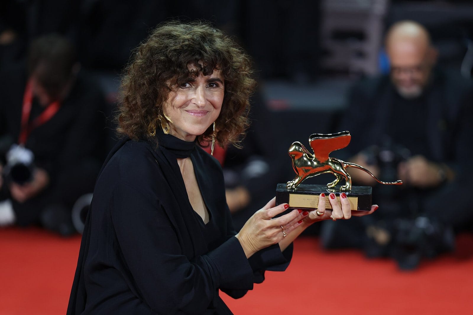 May el-Toukhy with the Golden Lion for Woman Unknown at the 83rd Venice International Film Festival.