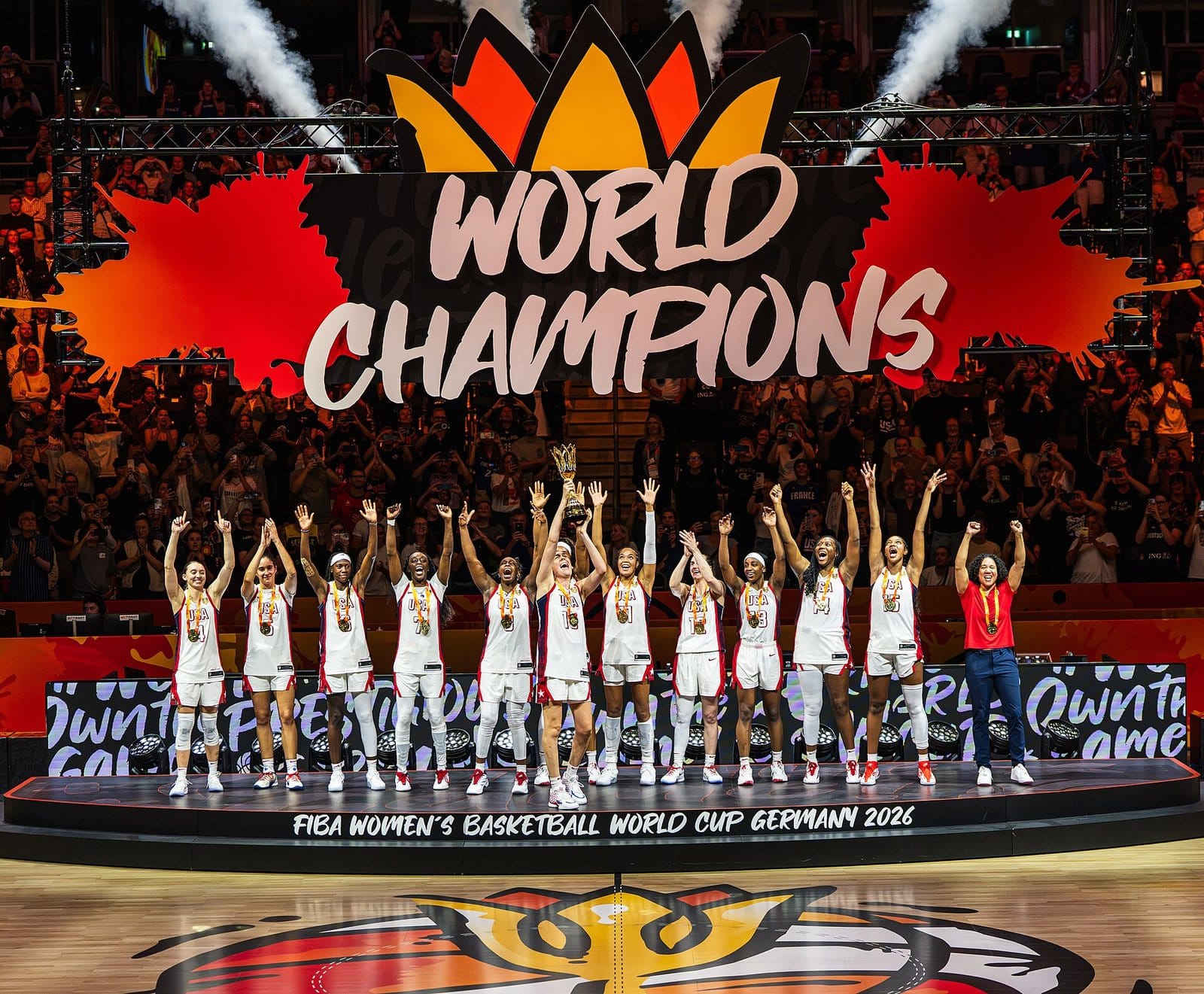 The United States team celebrates after the gold medal game against France at the 2026 FIBA Women's Basketball World Cup.