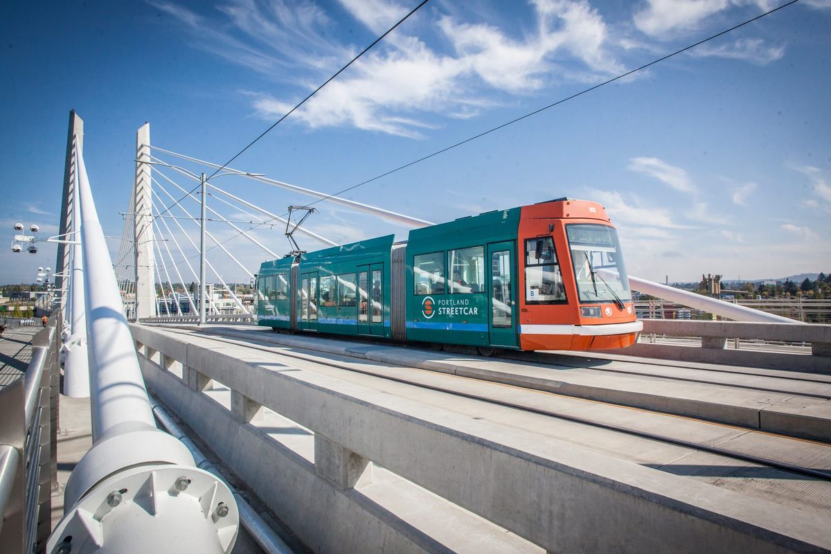A streetcar crossing the tilikum crossing bridge