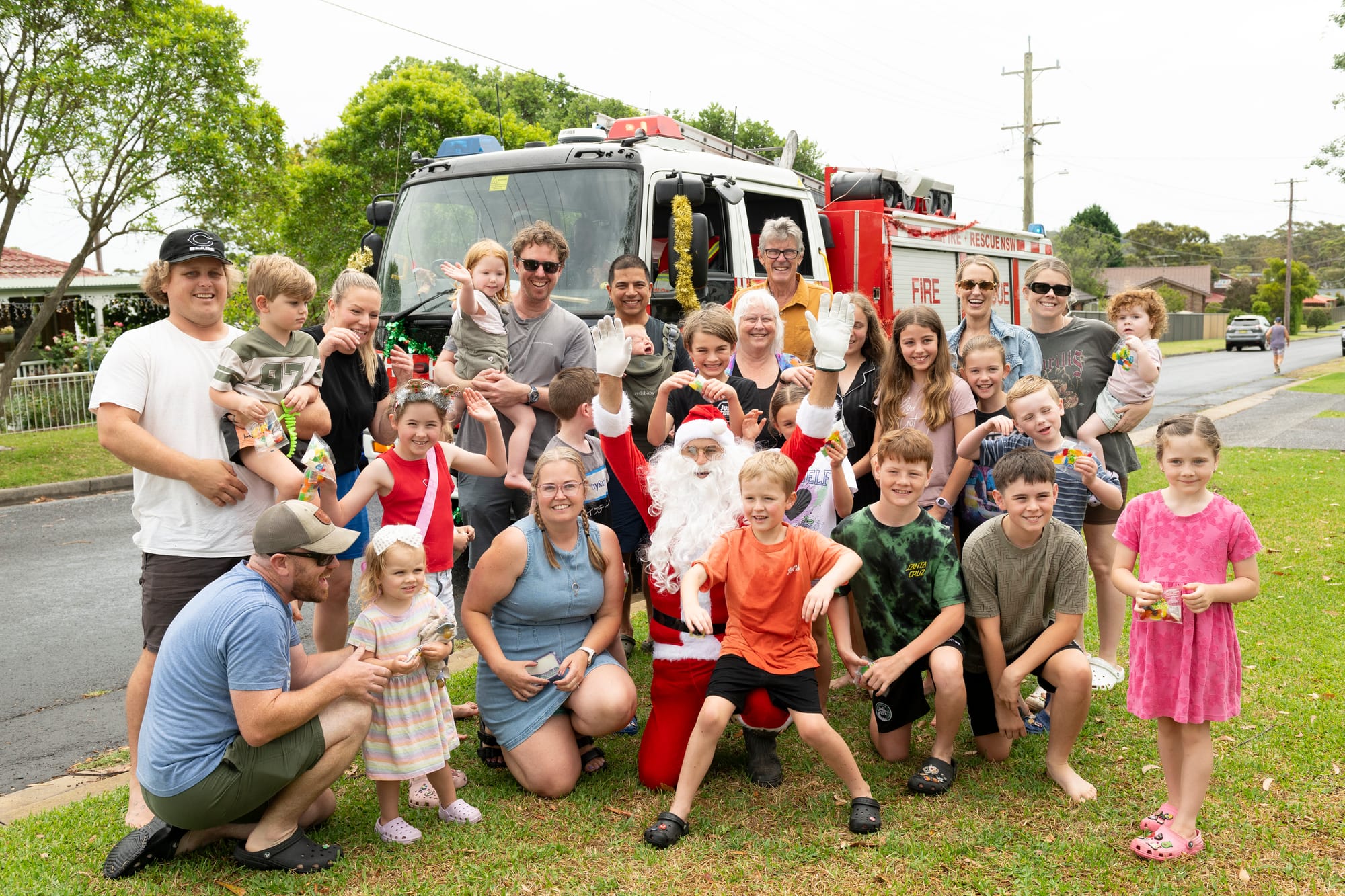 Santa boards big red fire truck for annual Lolly Run  post image