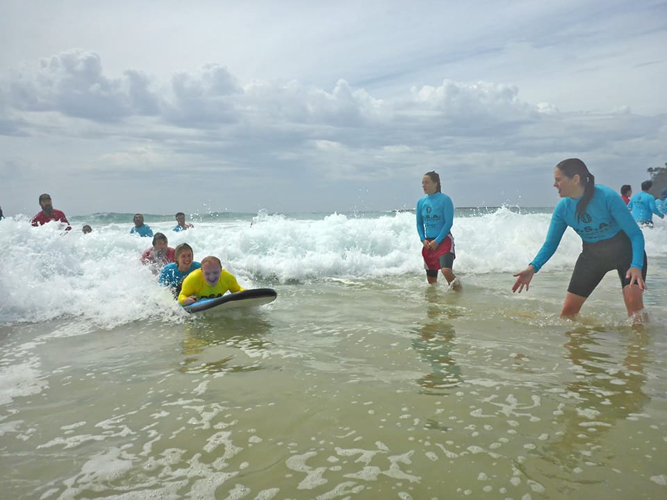 Disabled surfers ride the swell anew