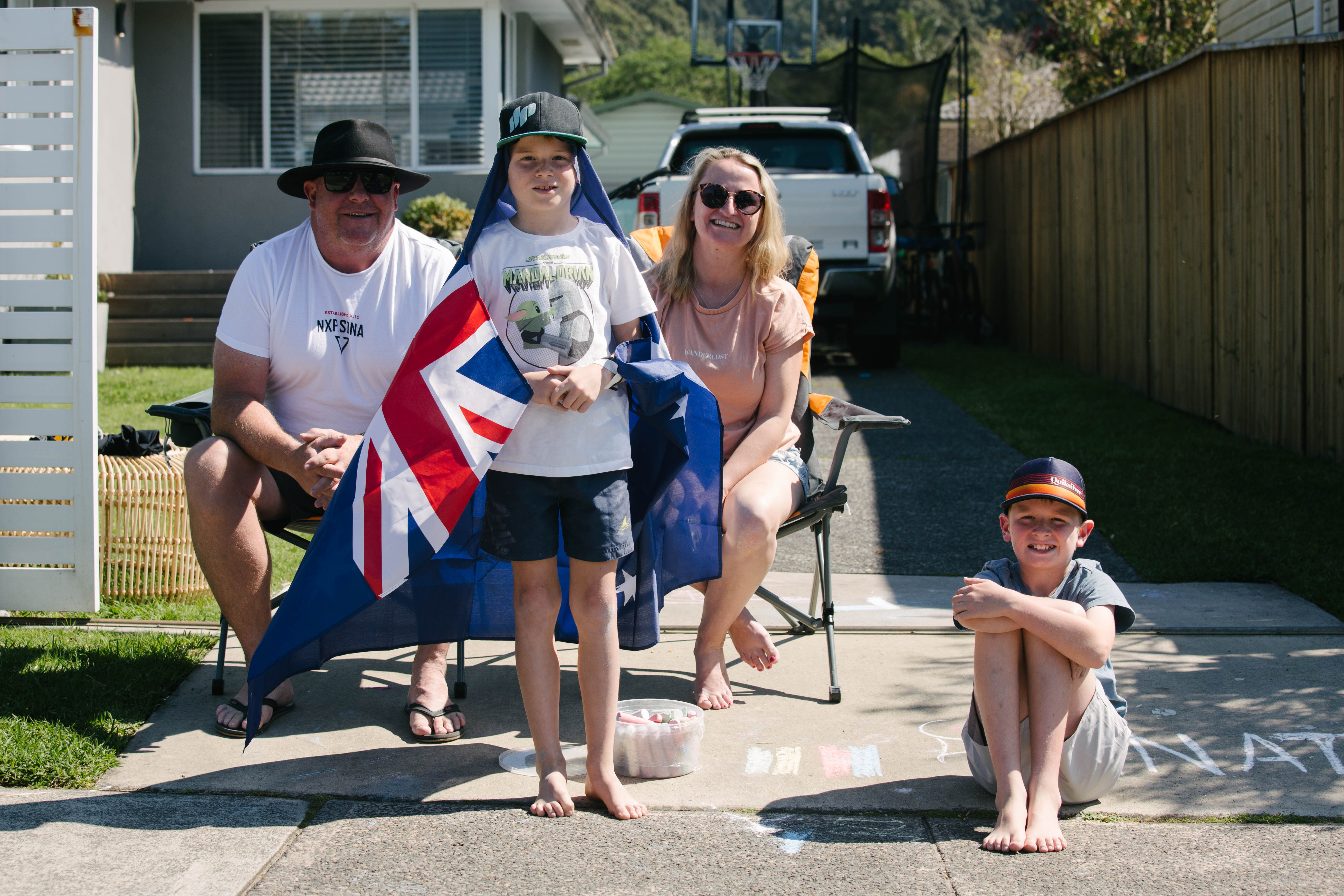 Elite riders race down the hill into Thirroul