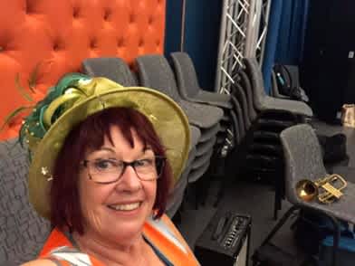 Long-term HONK! Oz volunteer​  Anne Steyer on venue door duty at the Wollongong Town Hall. 