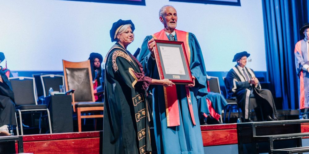 UOW graduates urged to 'thump table' for a better future post image