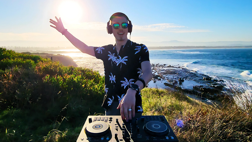 DJ Jordan Quill mixes sunset, stunning views and tropical house music on Windang Island post image