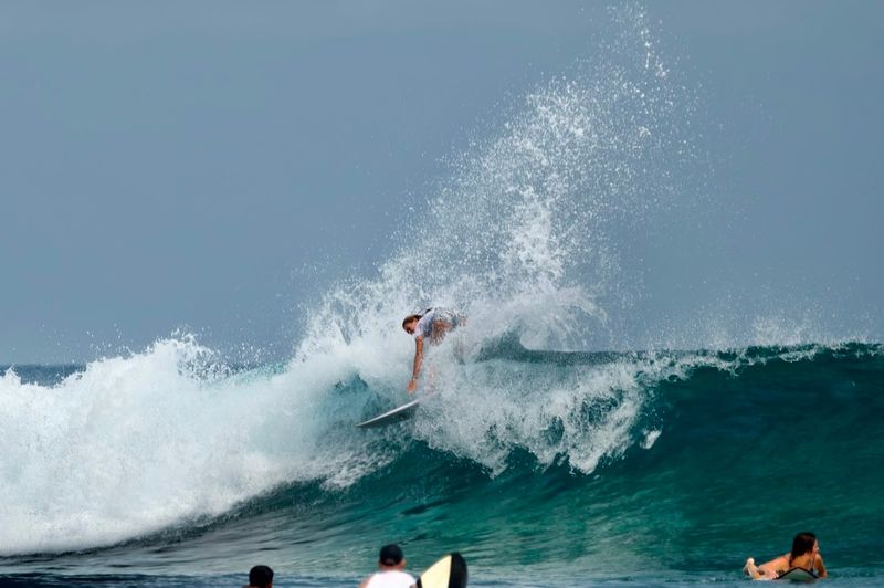 Student takes on nation's best surfers in shortboard titles post image