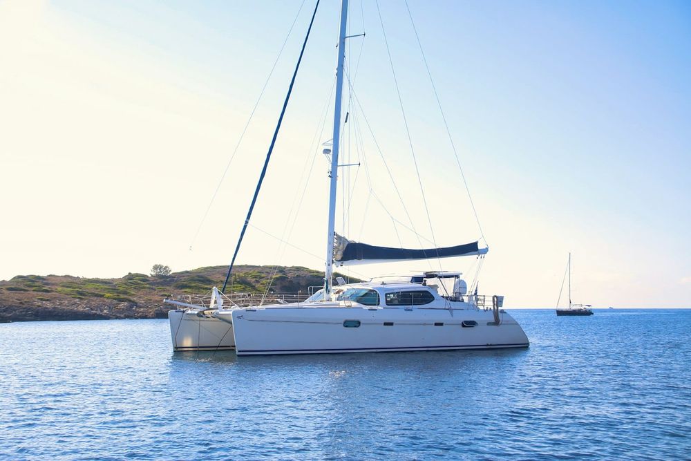 Cruising catamaran at anchor in Caribbean