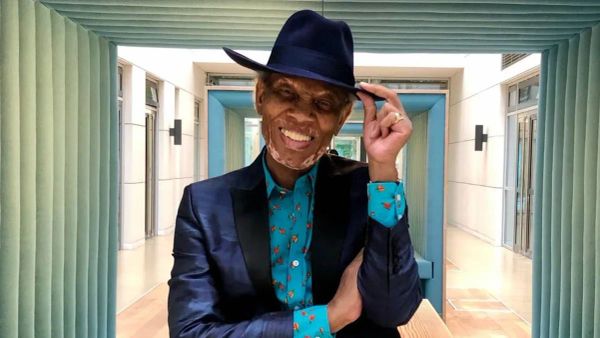 Wilfred Emmanuel-Jones in farm setting with The Black Farmer branding - The Inspiration Space