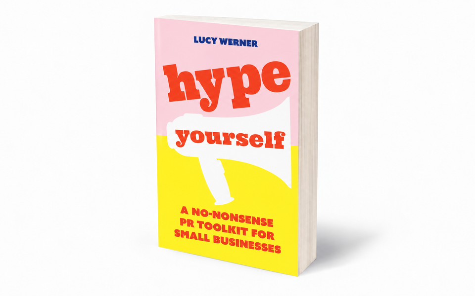 Three-dimensional mock-up of Hype Yourself by Lucy Werner, showing the pink and yellow paperback cover.