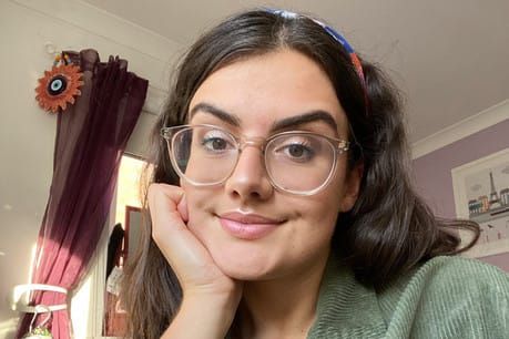 How did you get your first job at a weekly newspaper?