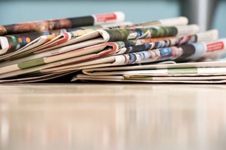 Report: UK newspapers engage readers far longer in print than online