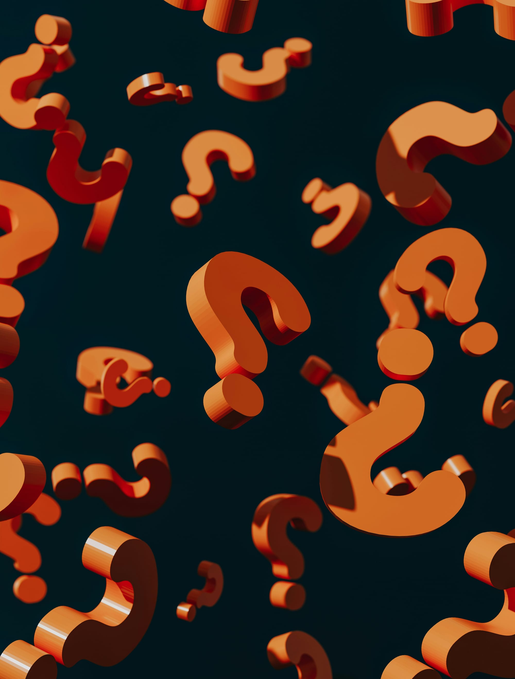 Flera 3D-frågetecken i orange som svävar i ett mörkt rum, symboliserar frågor eller quiz.