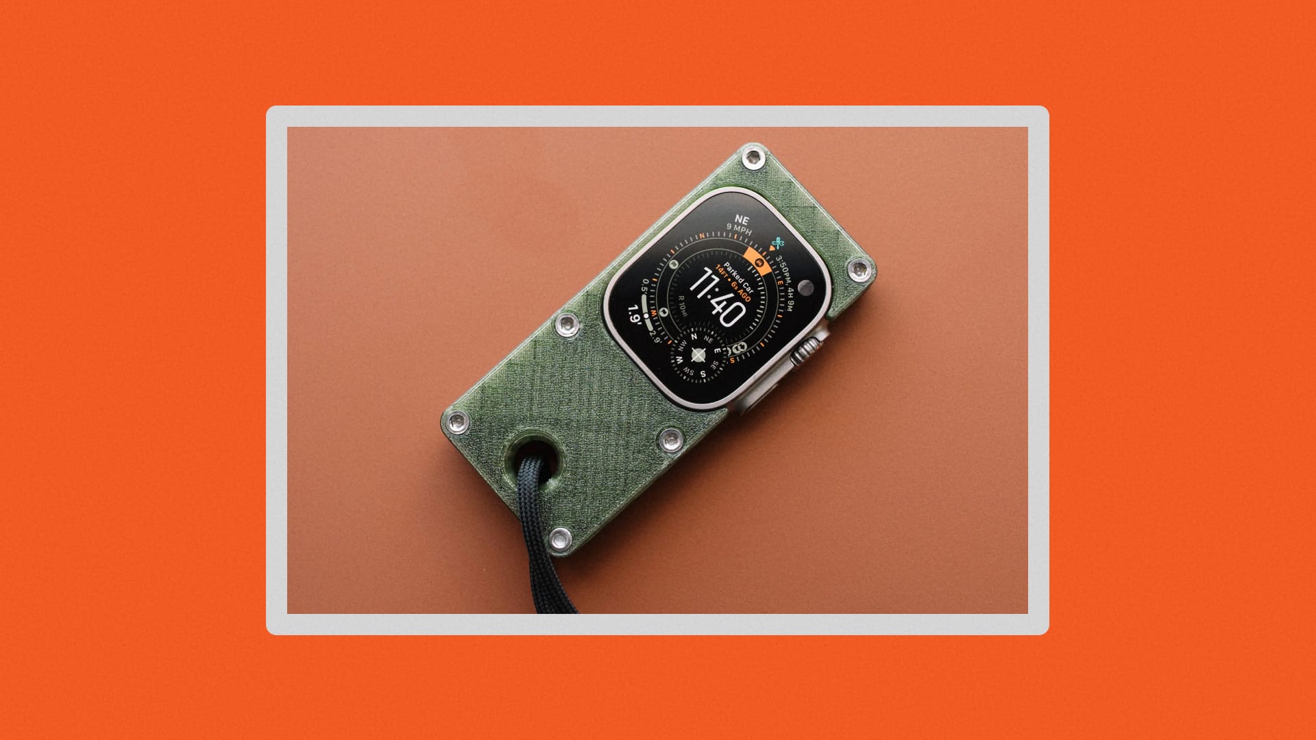 Apple Watch Ultra inside a green plastic case.
