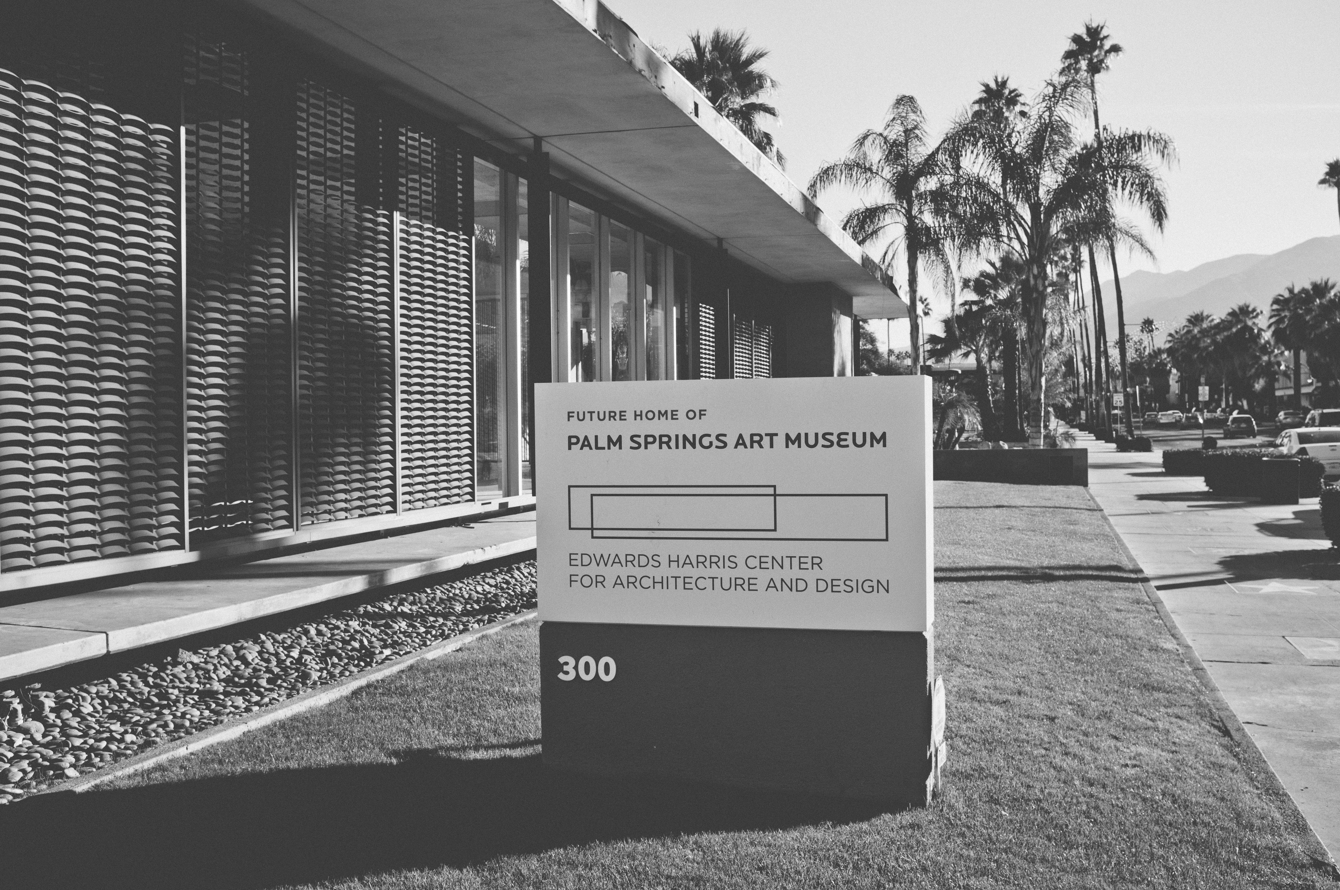 Signage reading 'PALM SPRINGS ART MUSEUM EDWARDS HARRIS CENTER FOR ARCHITECTURE AND DESIGN 300'.