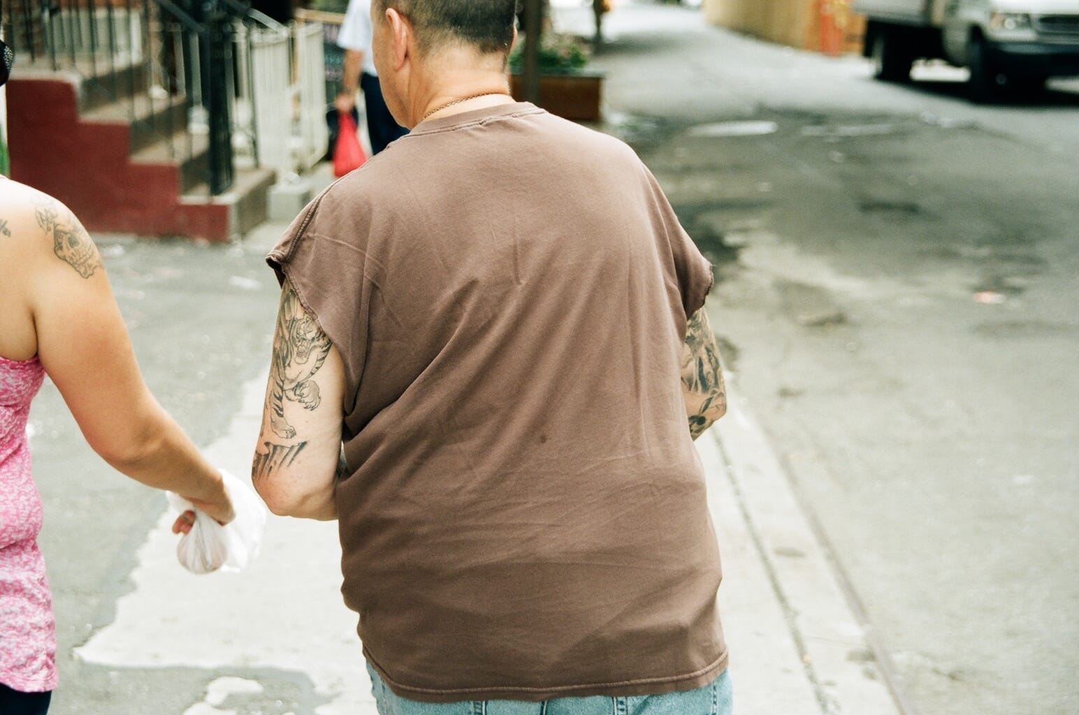 Candid street photography in New York City from a 35mm film roll.