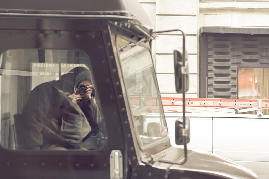 Photo of the Day - Self-Reflection In Front of Sleeping UPS Driver