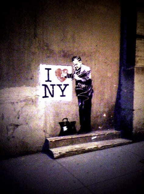 Banksy stencil graffiti art piece in New York City.