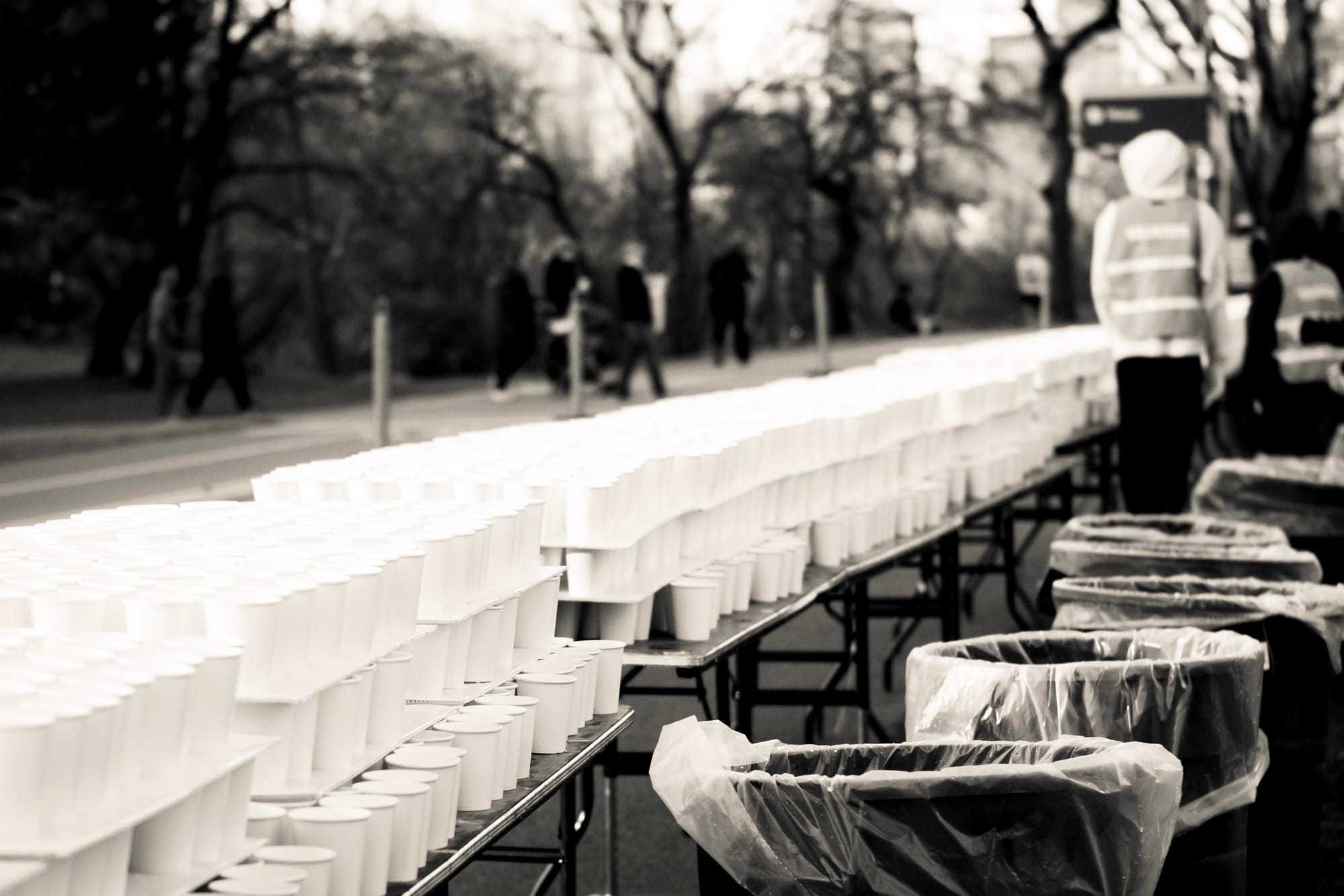 Volunteers and endless stacks of paper water cups lined up along the race course for the New York City Half Marathon.