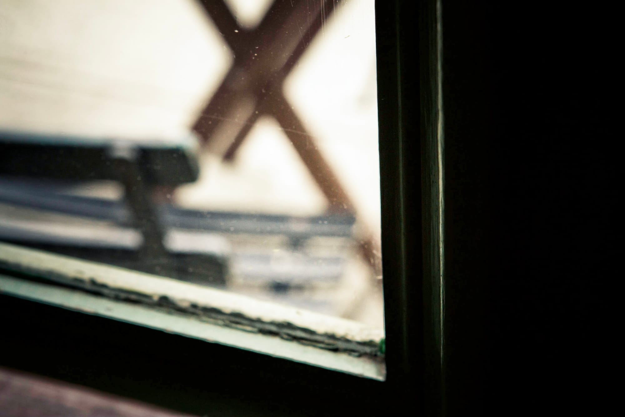 Relaxed afternoon scene sitting by the window enjoying brunch drinks and conversation at Meade's bar.