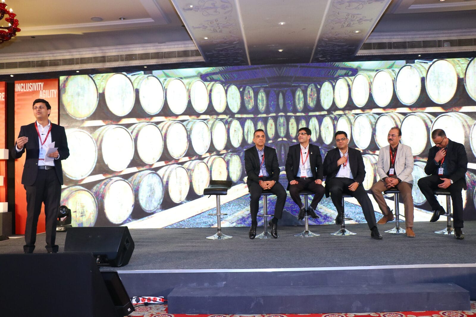 Anubhav Pateriya presenting to a panel of speakers