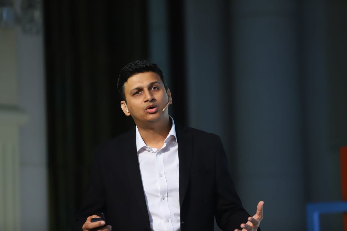 Anubhav Pateriya delivering a keynote on stage