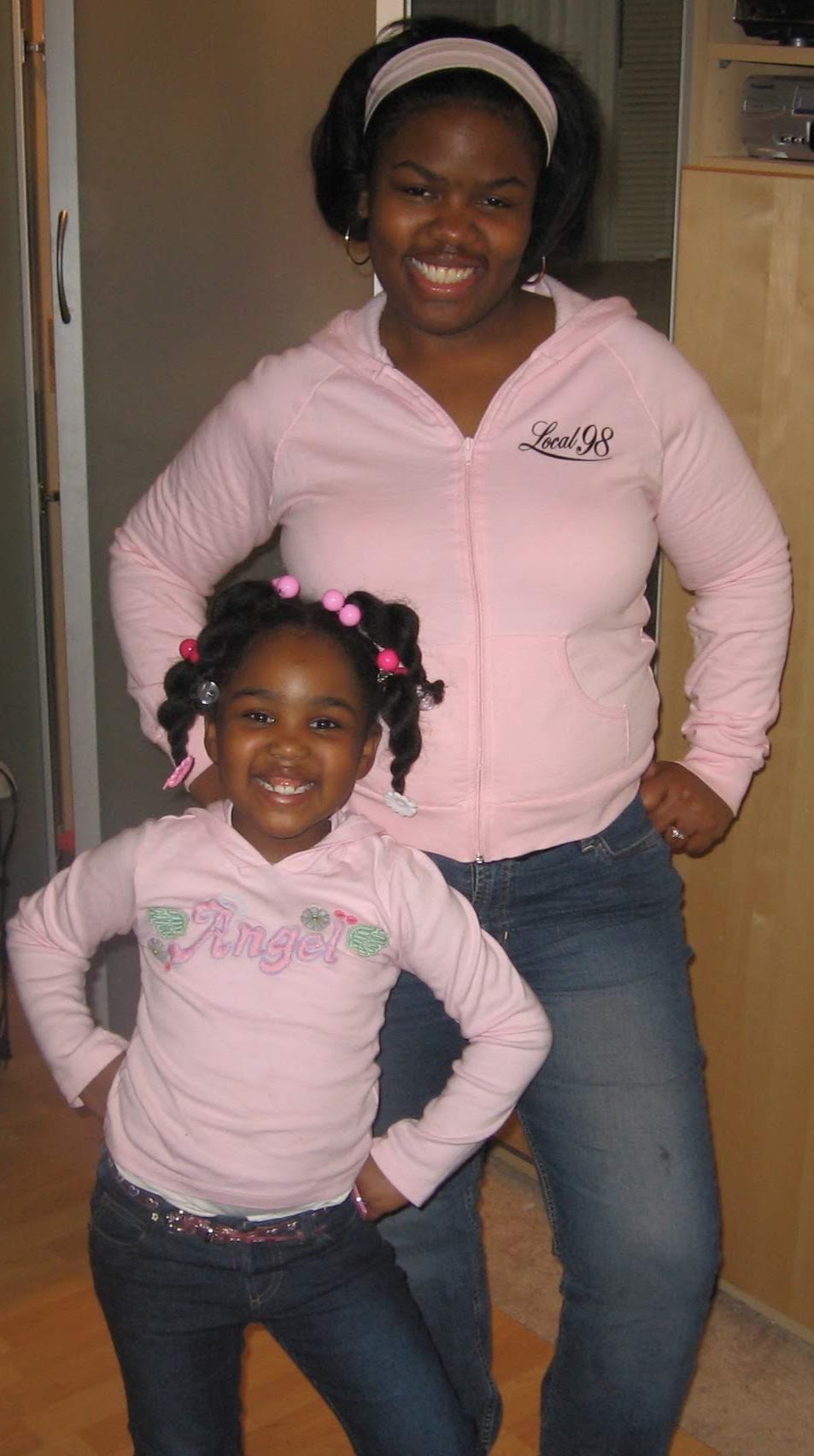 Carmen Johnson, as a child, smiling with her mother, Meesha Harris-Johnson, in the mid 2000s. Courtesy of Carmen Johnson