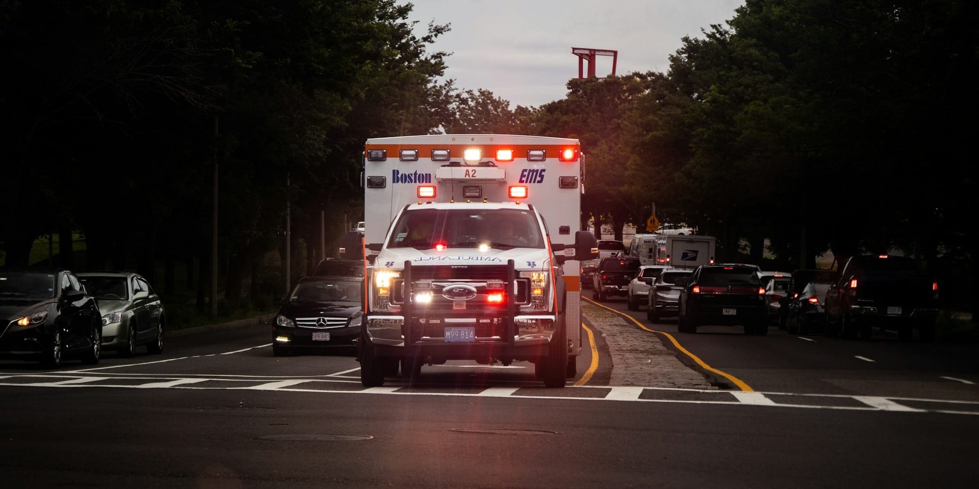 white and red car on road during night time