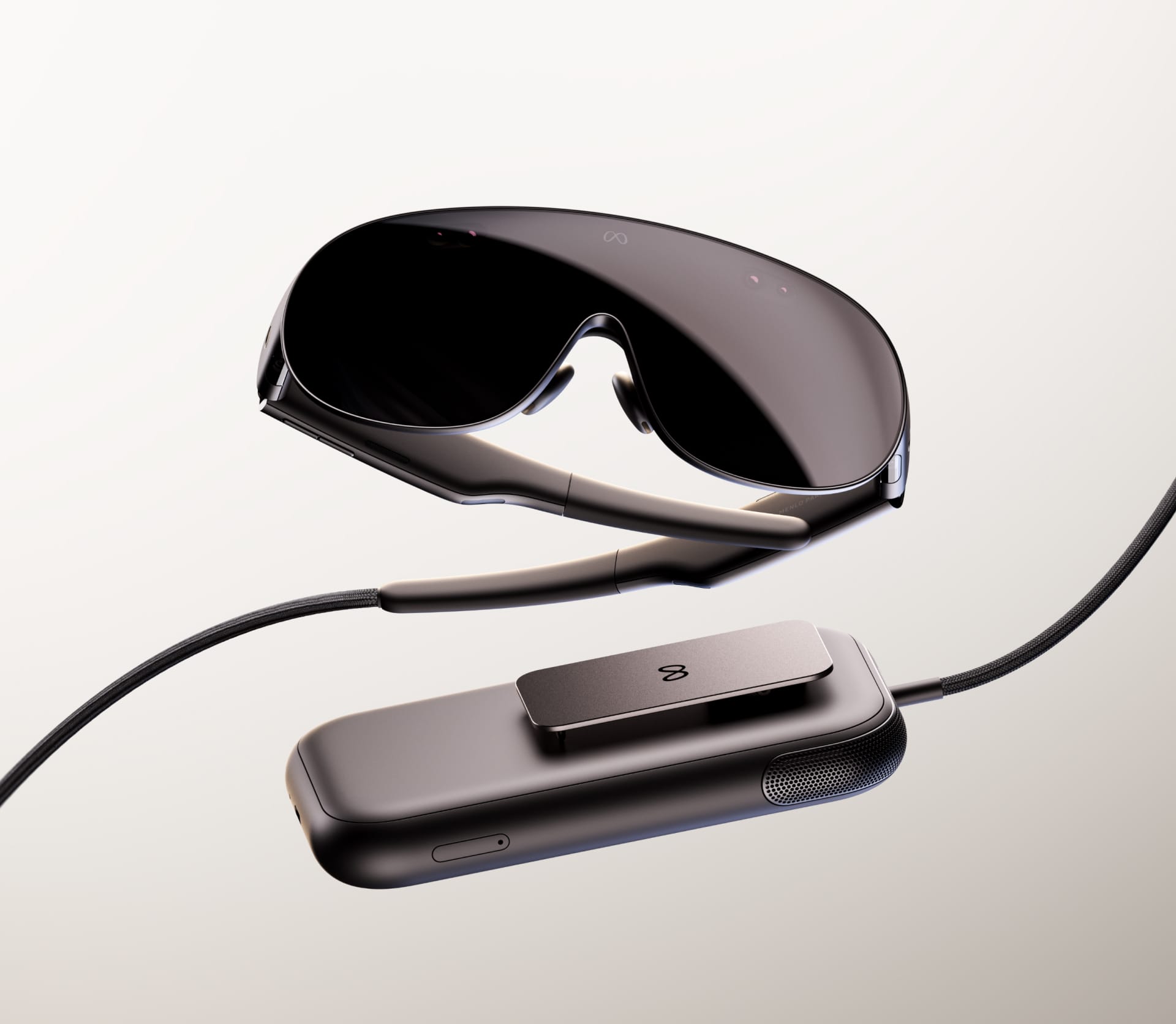 Meta VR Glasses 官方近照,展示眼鏡、連接線與外接運算盒