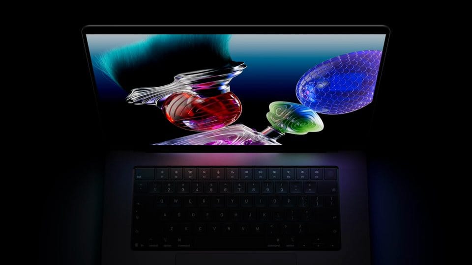 Apple 官方影片畫面：手指在 MacBook Pro 螢幕上操作