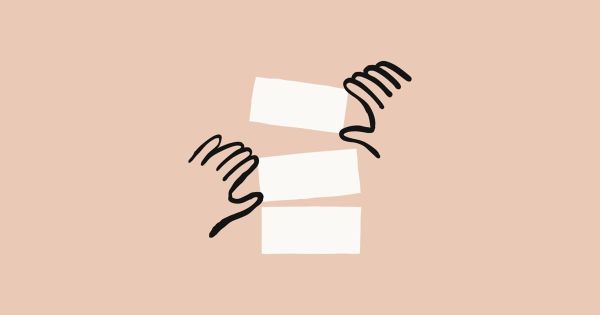 Anthropic 發表 Claude iOS App 時使用的官方插圖，畫面是兩隻手疊放白色方塊