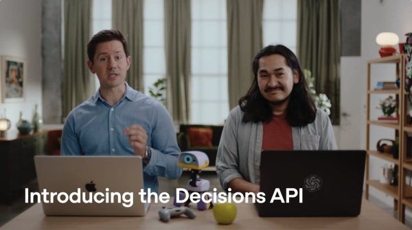 OpenAI Decisions API 官方介紹影片縮圖，兩位講者在筆電前說明介面