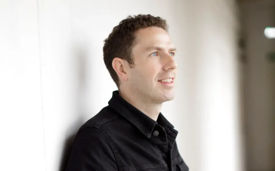 David Robson, science author, posing for a photo