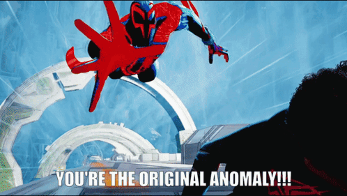 Screenshot of Across the Spider-Verse: Miguel O'Hara reaches up toward Miles. Caption of Miguel's dialogue reads You're the original anomaly!