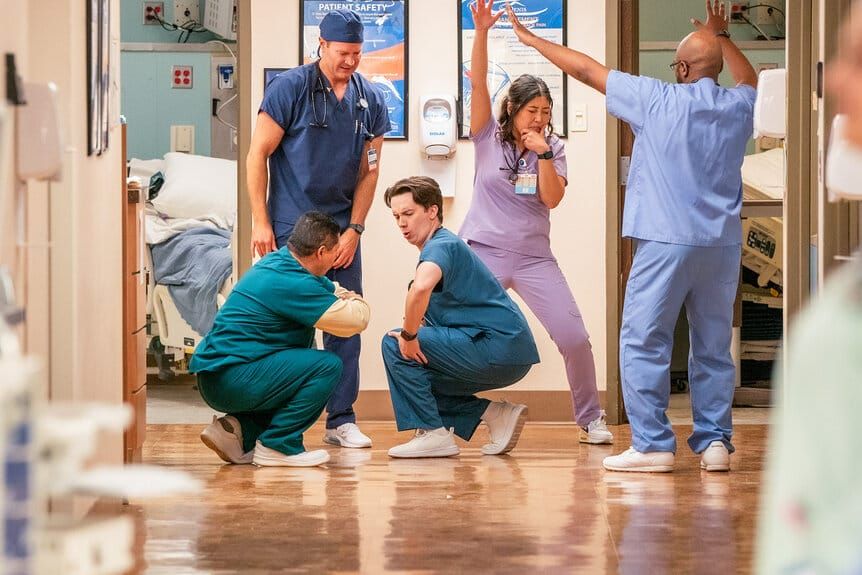 A group of doctors dance in a still from St. Denis Medical