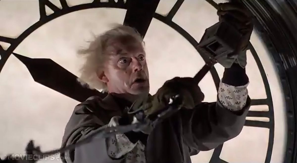 Back to the Future: Doc Brown stands on the clock tower, realizing he must reconnect the wire and risk electrocution to send Marty back (to the future).