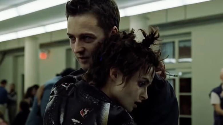 Fight Club: The Narrator and Marla talk while hugging in a fluorescent-lit support group.