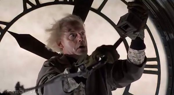 Back to the Future: Doc Brown stands on the clock tower, realizing he must reconnect the wire and risk electrocution to send Marty back (to the future).