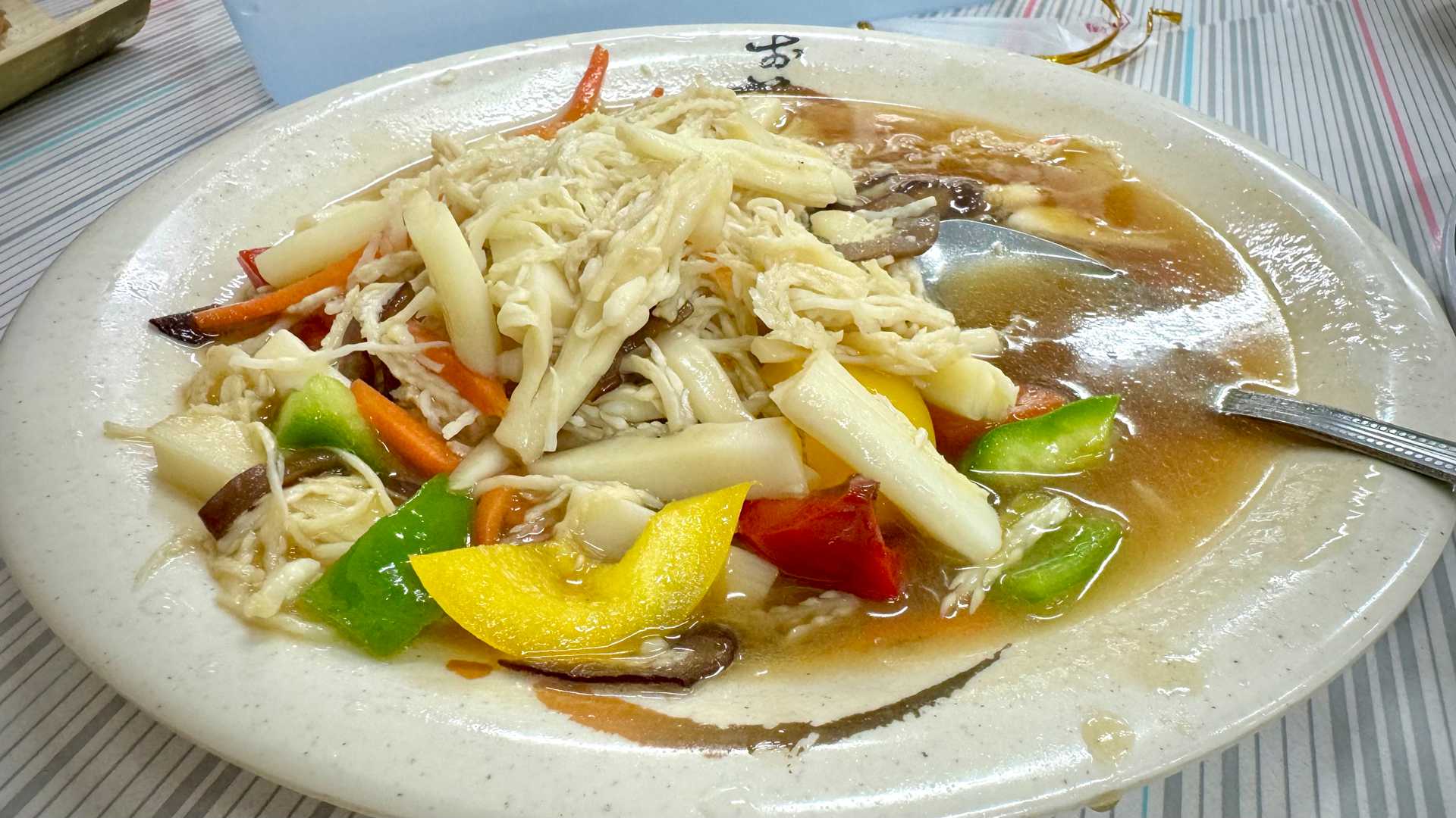 Betel nut flower stir fry dish on a plate.