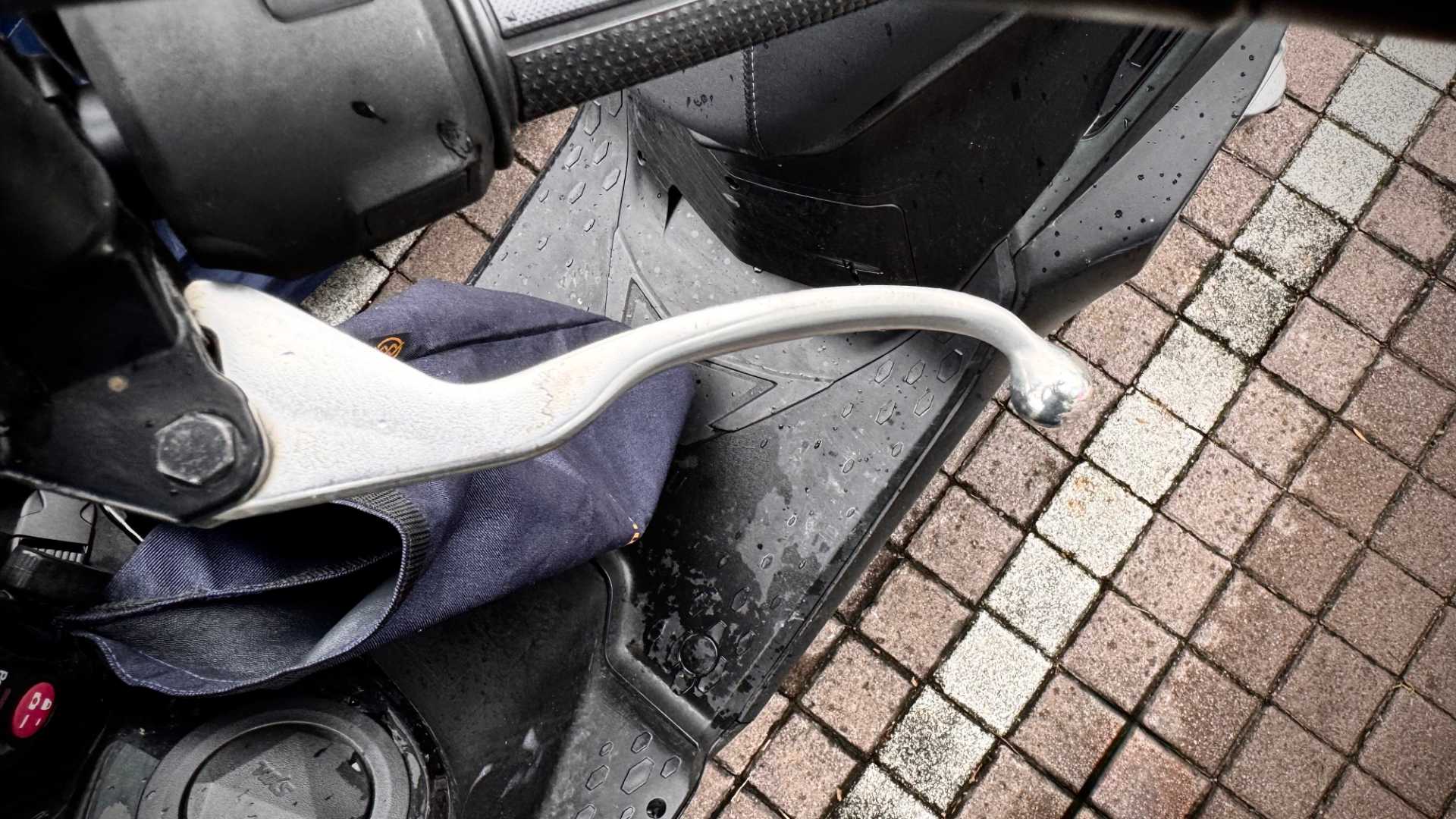 A bent brake handle on an MMBCU scooter.