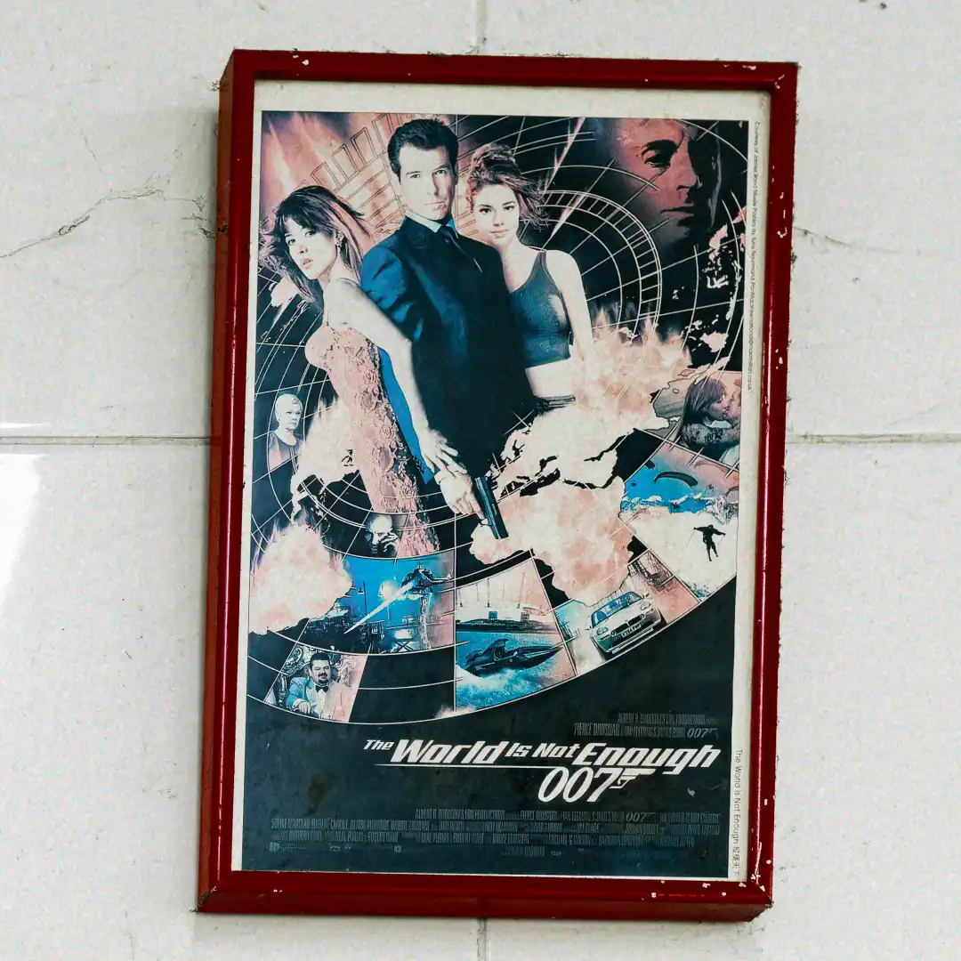Vintage framed poster for the 1999 James Bond movie The World Is Not Enough.