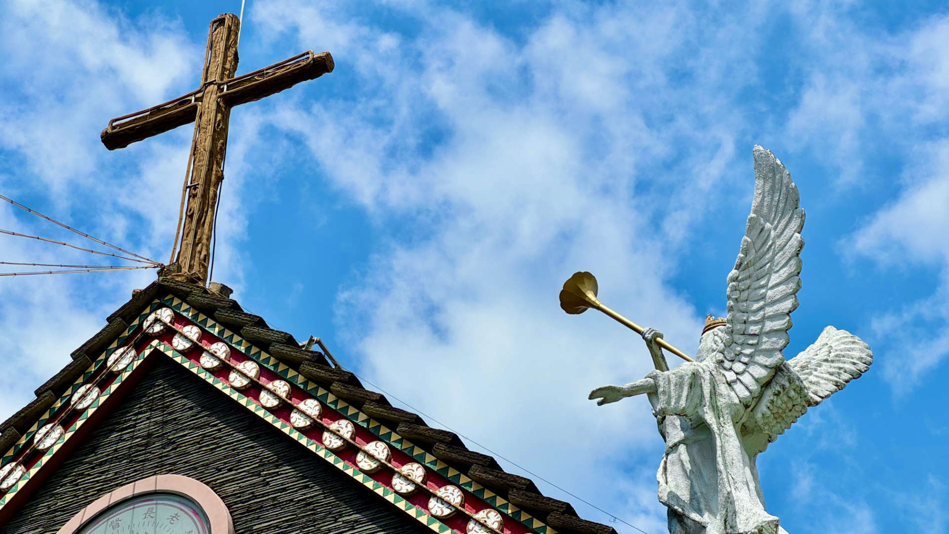 Close-up of a sculptural cross on the roof of the Wutai Presbyterian Church.