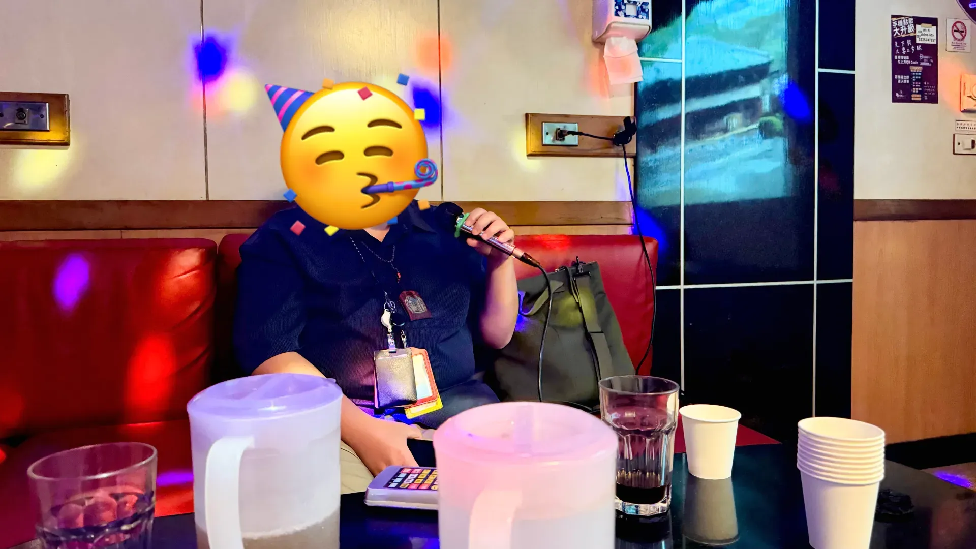 A man enthusiastically singing a KTV song in Kaohsiung, Taiwan.