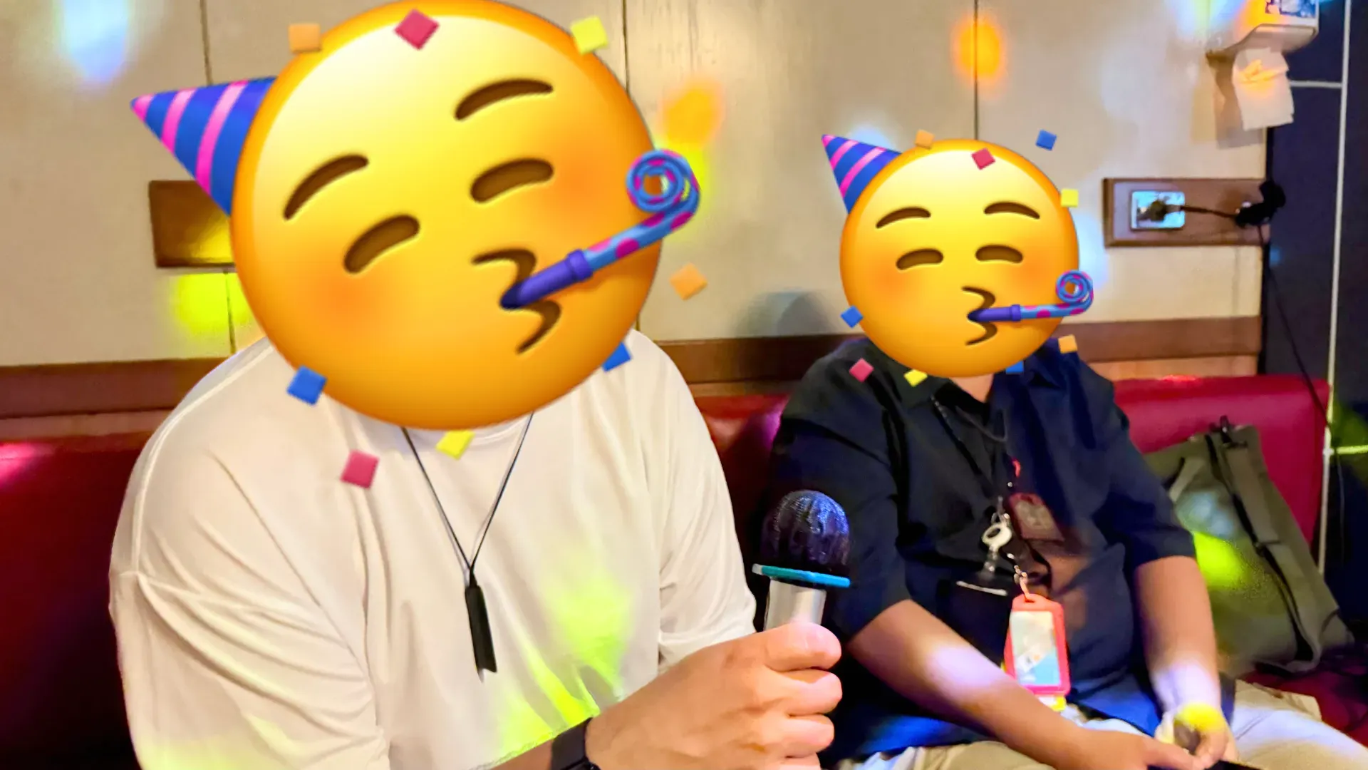 Two men singing a KTV song in Kaohsiung, Taiwan.