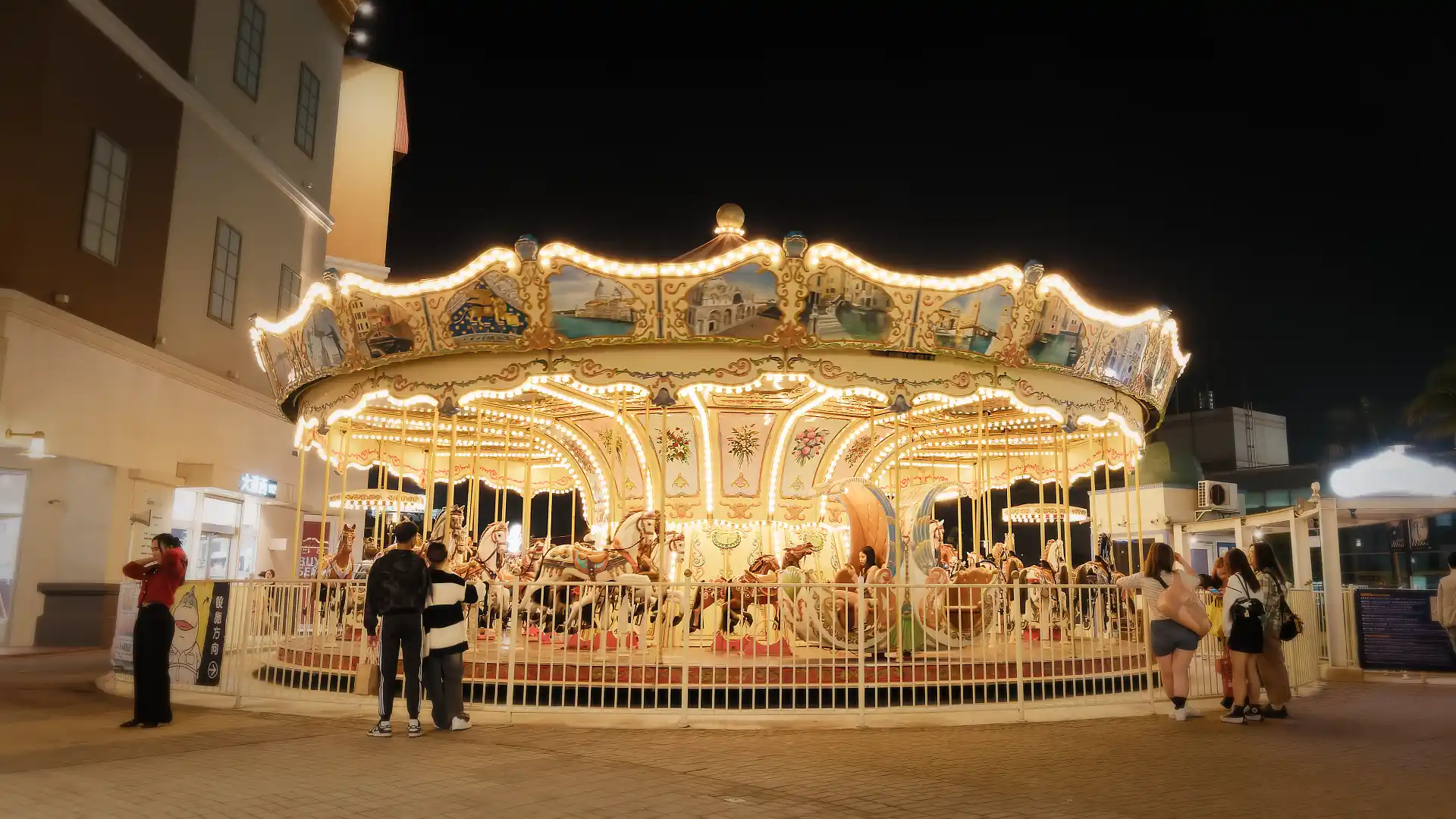 An elegantly lit classical carousel.